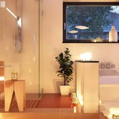 Salle de bain moderne et chaleureuse, baignée de lumière douce. Quel luminaire pour salle de bain choisir pour une ambiance zen ? Bougies et spots discrets créent une atmosphère relaxante.