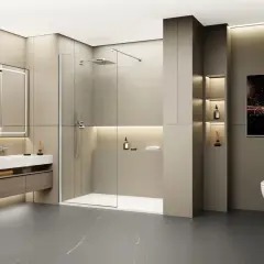 Salle de bain moderne avec un grand miroir lumineux, un lavabo suspendu et une spacieuse cabine de ressaut douche en verre.