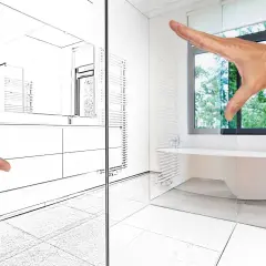 Plan d'une salle de bain moderne avec baignoire îlot et douche sans porte.