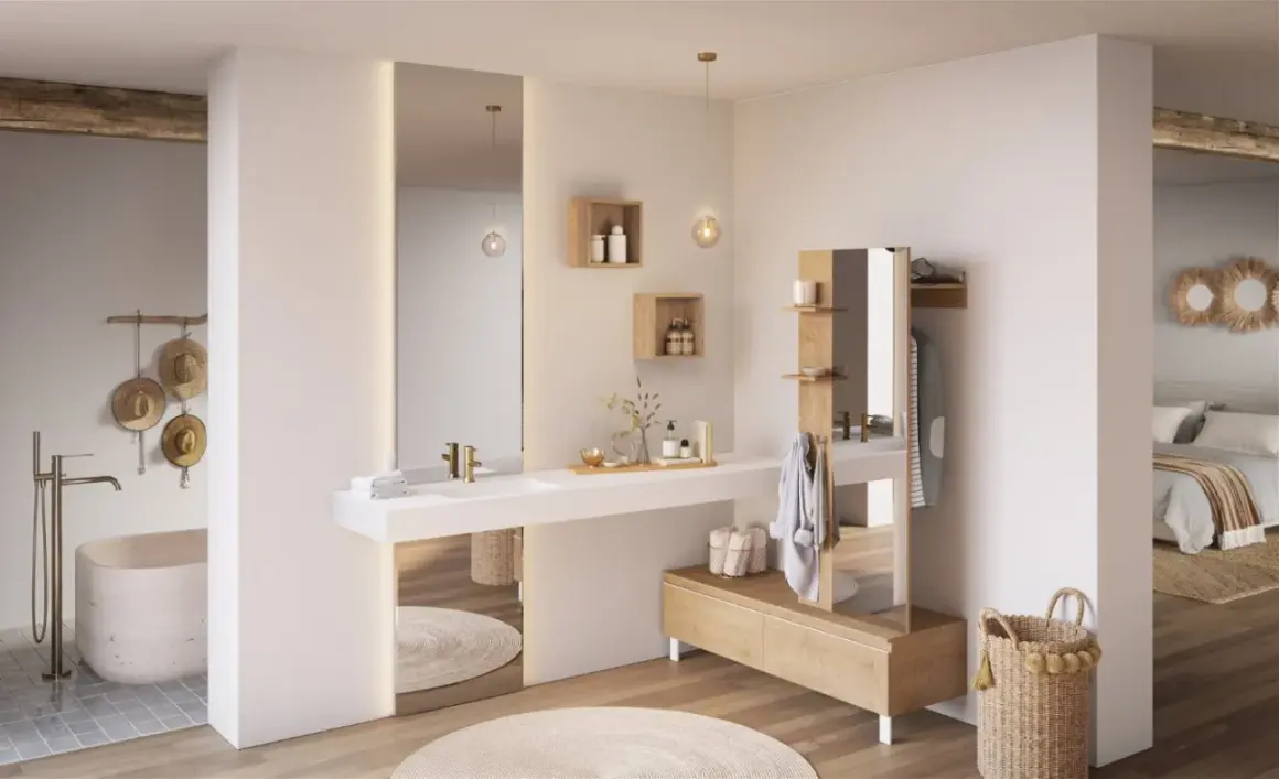 Une élégante salle de bain dans chambre, avec baignoire, lavabo, miroir et rangement en bois.