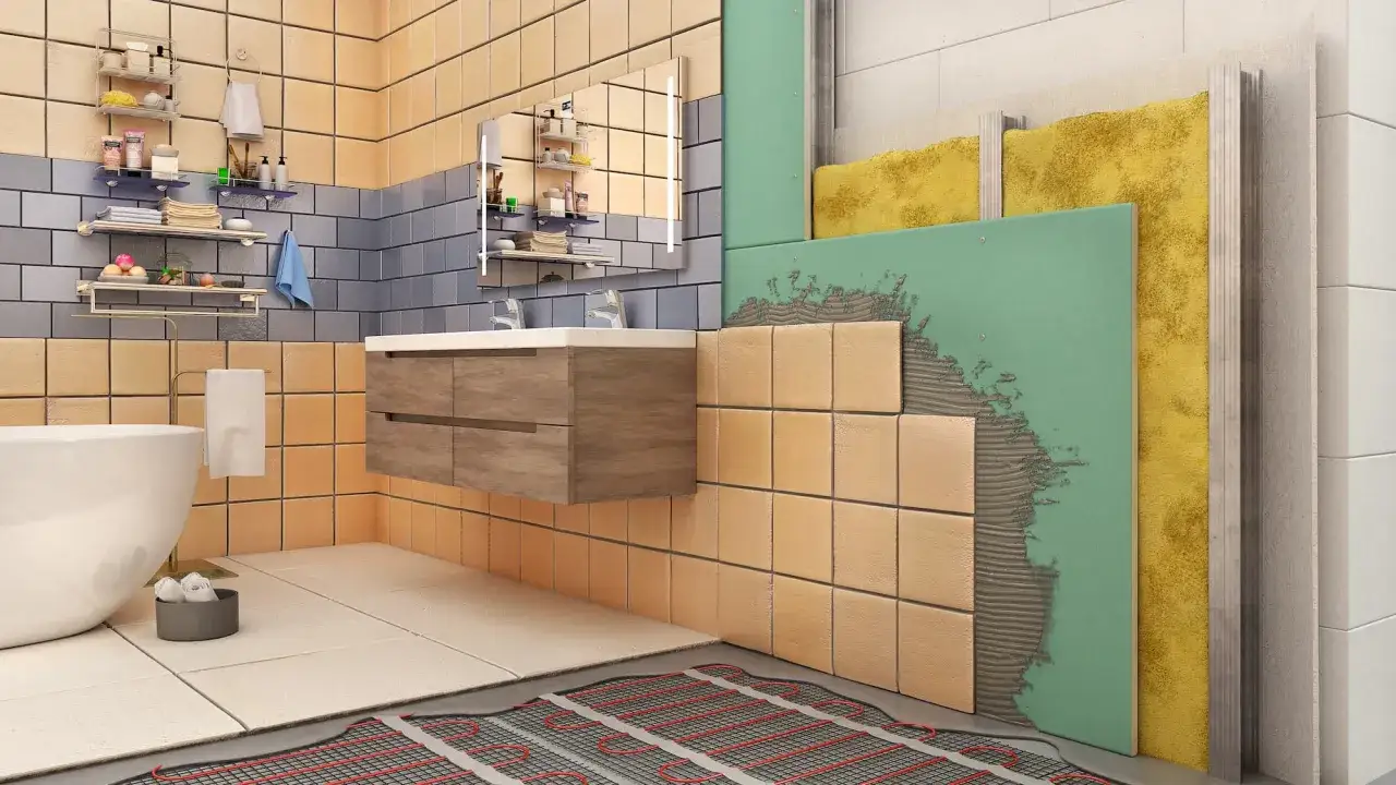 Salle de bain en coupe : carrelage, isolation, chauffage au sol. Une vision détaillée de la pose du carrelage, garantissant une décennale carrelage impeccable.